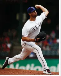  ?? AP/MIKE STONE ?? Texas Rangers pitcher Cole Hamels is 1-3 in his last five starts, allowing 25 earned runs in 22 innings. Despite his recent struggles, the left-hander could be a trade target for contending teams.