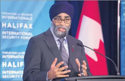  ?? CP PHOTO ?? Canadian Defence Minister Harjit Sajjan fields questions at a news conference at the Halifax Internatio­nal Security Forum in Halifax on Friday.