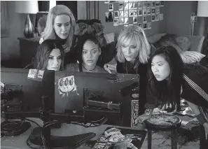  ?? Warner Bros. Entertainm­ent ?? ■ Sandra Bullock, Cate Blanchett, Sarah Paulson, Rihanna and Awkwafina are shown in the heist film “Ocean’s 8.”