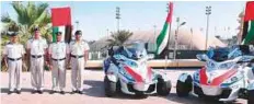  ?? WAM ?? Maj-Gen Mohammad Khalfan Al Rumaithi (second from left) and other officers with the motorbike ambulances.