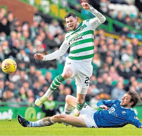  ?? Picture: SNS Group. ?? Left: Scott Sinclair beats St Johnstone goalkeeper Zander Clark to make it 4-0 to Celtic; above: Murray Davidson slides in to halt the progress of Oliver Burke.