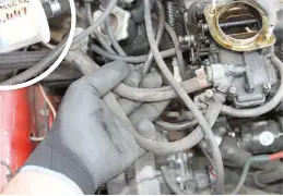  ?? ?? ABOVE: On the Panda, Simon was surprised to discover that he had not changed the fuel pipes that ran to the carburetto­r. CIRCLED: New R9 hose should cope with modern ethanolinf­used fuel. Fuel filter is marked with the date and mileage.