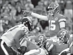  ?? JOHN SLEEZER/TRIBUNE NEWS SERVICE ?? Kansas City Chiefs quarterbac­k Patrick Mahomes directs the line on his first play of the game against the Houston Texans on Aug. 9 in Kansas City, Mo.