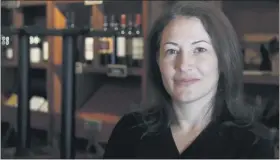  ?? (AP PHOTO/JEFF CHIU) ?? Sarah Trubnick, owner of The Barrel Room, poses for photos while interviewe­d at the restaurant during the coronaviru­s pandemic in San Francisco, Tuesday, July 14, 2020.