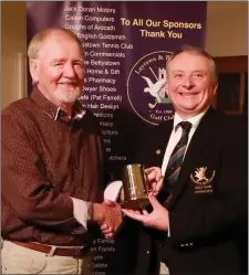  ??  ?? Club Captain Bryan Collins presents the PGA Tankard at Laytown &amp; Bettystown Golf Club to winner Thomas Keating.