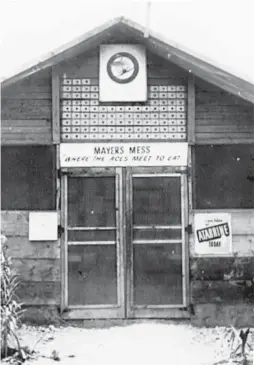  ??  ?? The impressive kill score can be seen over the mess hall on Okinawa in early 1945. These scores were amassed by many of the pilots. The top three in the VMF-323 were Lts. O’Keefe, Wade, and Rusham with seven kills each. (Photo by George Axtell)