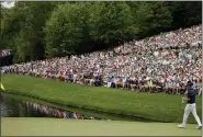  ?? MATT SLOCUM — THE ASSOCIATED PRESS ?? Jordan Spieth waits to putt on the 16th hole during the fourth round of the Masters in 2015.