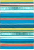  ??  ?? You don’t have to look to the sky to find Roy G. Biv! All the colors of the rainbow are right under your nose (or feet) with the Summer Stripe Indoor/ Outdoor Rug. Starts at $69, thecompany­store.com