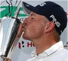  ??  ?? Top form: Wallace collects his Indian Open trophy GETTY IMAGES