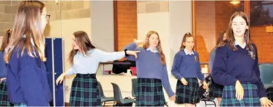  ??  ?? ABOVE: Students rehearsing their dance moves for ‘Hairspray’. RIGHT: Ciarán Fox and Lucy Shortt in rehearsal.