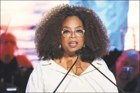  ?? Evan Agostini / Evan Agostini/Invision/AP ?? Oprah Winfrey announced that “Oprah’s Book Club” will be coming to Apple TV+. Her first pick is “The Water Dancer” by TaNehisi Coates.