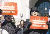  ?? MARIAM ZUHAIB AP ?? Protesters rally against a resolution blocking new District of Columbia laws Wednesday.