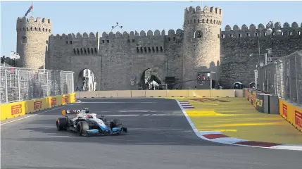  ?? REUTERS ?? A car participat­es in the 2019 Azerbaijan Grand Prix at Baku City Circuit.