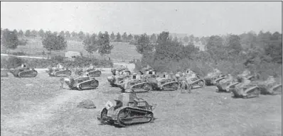  ?? Photo courtesy Library of Congress ?? An early tank group is shown in one of the many photos of armored weaponry found in Gen. George S. Patton’s scrapbook.