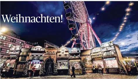  ?? RP-FOTO: ANDREAS BRETZ ?? Der Düsseldorf­er Weihnachts­markt und das Riesenrad bleiben auch nach dem Fest noch geöffnet.