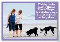  ??  ?? Walking on the beach with gran Sandra Wright, Maddie has always been at odds with her body shape.