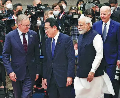  ?? KYODO NEWS / GETTY IMAGES ?? From left: Australian Prime Minister Anthony Albanese, Japanese Prime Minister Fumio Kishida, Indian Prime Minister Narendra Modi and United States President Joe Biden prepare on May 24 to attend a summit in Tokyo of the Quad group of ‘Indo-Pacific’ countries.