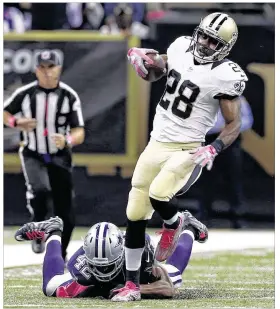  ?? JONATHAN BACHMAN /AP ?? New Orleans running back C.J. Spiller breaks free for the game-winning touchdown Sunday in the Saints’ victory over the Dallas Cowboys in New Orleans.