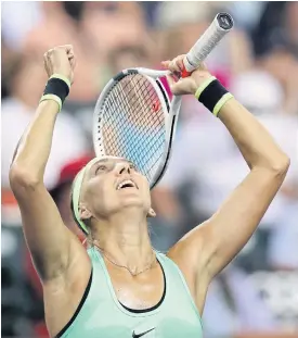  ??  ?? Elena Vesnina celebrates after beating Venus Williams.