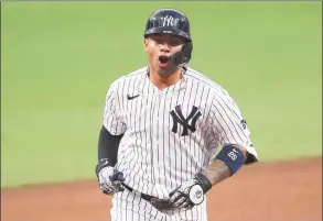  ?? Sean M. Haffey / Getty Images ?? The Yankees’ Gleyber Torres celebrates after hitting a two-run home run against the Rays in Game 4 of the ALDS Thursday in San Diego.