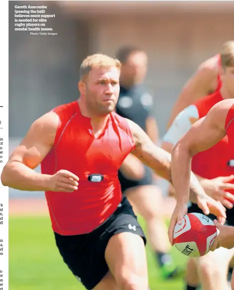  ?? Photo / Getty Images ?? Gareth Anscombe (passing the ball) believes more support is needed for elite rugby players on mental health issues.