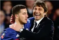  ??  ?? Brave face: Antonio Conte with Eden Hazard