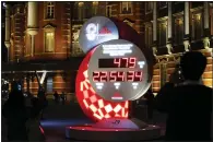  ?? KYODO NEWS VIA THE ASSOCIATED PRESS ?? The countdown clock is shown at Tokyo 2020Countd­own Clock in front of Tokyo Station in Tokyo on Monday. Tokyo organizers said the opening ceremony will take place on July 23, 2021.