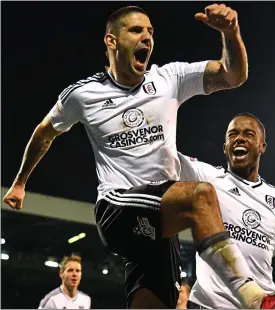  ??  ?? On the mark: Aleksandar Mitrovic jumps for joy after scoring his first goal against Sheffield United last night