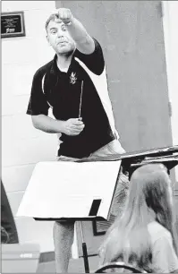  ??  ?? Olive Branch High School band director Aaron Bailey is the community band conductor.