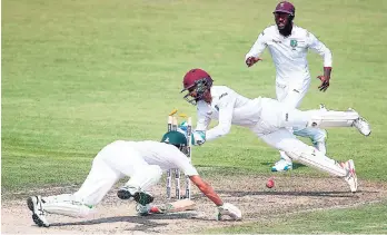  ?? WINDIES MEDIA ?? Shai Hope of West Indies attempts to stump Younis Khan of Pakistan during day one of the third Test between Pakistan and West Indies at Sharjah Cricket Stadium in Sharjah, United Arab Emirates yesterday.