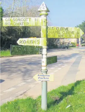  ??  ?? A project to restore hundreds of rusty cast-iron fingerpost­s had a better outcome for Exmoor than the restrictio­n of swaling (below), a technique for managing moorland which involves burning off areas of older vegetation