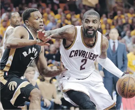  ?? TONY DEJAK/THE ASSOCIATED PRESS ?? Point guard Kyrie Irving, right, is headed to the Boston Celtics in a deal that sent point guard Isaiah Thomas, forward Jae Crowder, centre Ante Zizic and a draft pick to Cleveland.