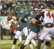  ?? RICK KAUFFMAN - DIGITAL FIRST MEDIA ?? Eagles quarterbac­k Nick Foles played well enough for a victory Saturday in a 15-10 win over the reigning NFC champion Atlanta Falcons.