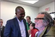  ??  ?? Actor Griffin Dunne, right, known for his recent role in the NBC drama series “This is Us,” was among those visiting with U.S. Rep Antonio Delgado during his meet-and-greet session at his new office at 256 Clinton Ave. in Kingston.