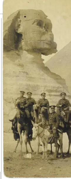  ??  ?? Above: A group of soldiers with a local guide pose in front of the Sphinx. The number at left is the photograph­er’s reference number. Donor: Teifion Davies