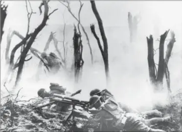  ?? ASSOCIATED PRESS ?? In this Sept. 26, 1918file photo, a U.S .Army 37-mm gun crew man their position during the World War One MeuseArgon­ne Allied offensive in France. It was America’s largest and deadliest battle ever, with 26,000U.S. soldiers killed and tens of thousands wounded. A hundred years ago, the Meuse-Argonne offensive contribute­d to bring an end to of World War One.