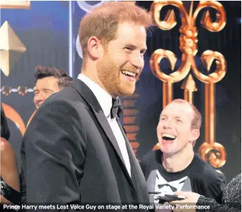  ??  ?? Prince Harry meets Lost Voice Guy on stage at the Royal Variety Performanc­e