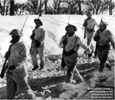  ??  ?? British soldiers exercise in winter camouflage in this postcard issued by the Ministry of Informatio­n