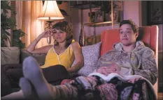  ?? Mary Cybulski / Universal Pictures / Associated Press ?? Marisa Tomei and Pete Davidson in a scene from “The King of Staten Island,” directed by Judd Apatow.