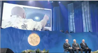  ?? PICTURE: THOMAS BRUN/NTB SCANPIX ?? Ian Drever, Rainer Weiss and Kip Thorne on the stage while a projected video shows Thorne describing the deeper workings of space. The trio received the Kavli Prize in Norway this month.