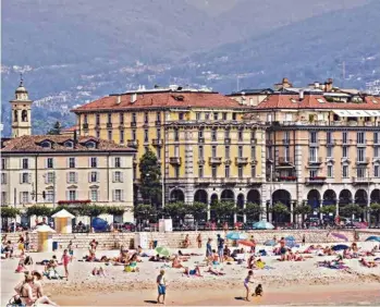  ?? (TARAS VYSHNYA VLADZETTER) ?? En image de synthèse, ce à quoi pourrait ressembler la plage de Lugano.