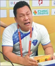  ?? PROVIDED TO CHINA DAILY ?? Meng Yongli, chairman of Baoding Rongda FC, weeps after Saturday’s Chinese League One match with Wuhan Zall. He resigned from the post on Sunday.