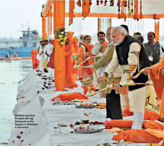  ??  ?? PM Modi and Uttar Pradesh CM Yogi Adityanath at the Sangam in Allahabad in December