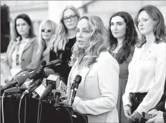  ?? CHRIS PIZZELLO/AP ?? Actress Louisette Geiss addresses the media with the “Silence Breakers,” a group of women who have spoken out about Hollywood producer Harvey Weinstein’s sexual misconduct, at Los Angeles City Hall on Feb. 25.