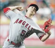  ?? Bob Levey Getty Images ?? TIM LINCECUM has an ERA of 8.70 in seven starts as an Angel, but his attitude remains positive.