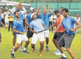  ??  ?? The India Davis Cup team, (from left) reserve Sumit Nagal, Leander Paes, Rohan Bopanna and Saketh Myneni, break into a dance after the 4-1 win over South Korea in the Asia/Oceania Group tie. KARUN SHARMA/HT