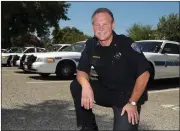  ?? AP FILE PHOTO BY JOAN BARNETT LEE ?? In this 2011 photo, former Oakdale Police Chief Marty West is pictured at the department in Oakdale, Calif.