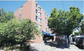  ?? DARREN STONE, TIMES COLONIST ?? The new home for former tent city residents at 844 Johnson St. is a residentia­l property, not a health facility, an arbitrator has ruled.