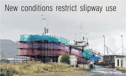  ?? PHOTO: LINDA ROBERTSON ?? On the way out . . . Stringent new resource consent conditions mean few vessels will use the 40yearold Kitchener St slipway; pictured, Port Otago’s dredge New Era on the slipway in 2013.