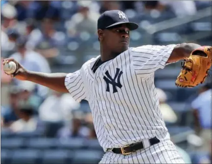  ?? JULIE JACOBSON — THE ASSOCIATED PRESS ?? New York Yankees pitcher Luis Severino delivers against the Cincinnati Reds during the first inning of the Yankees’ 9-5 victory over the Reds Wednesday at Yankee Stadium.